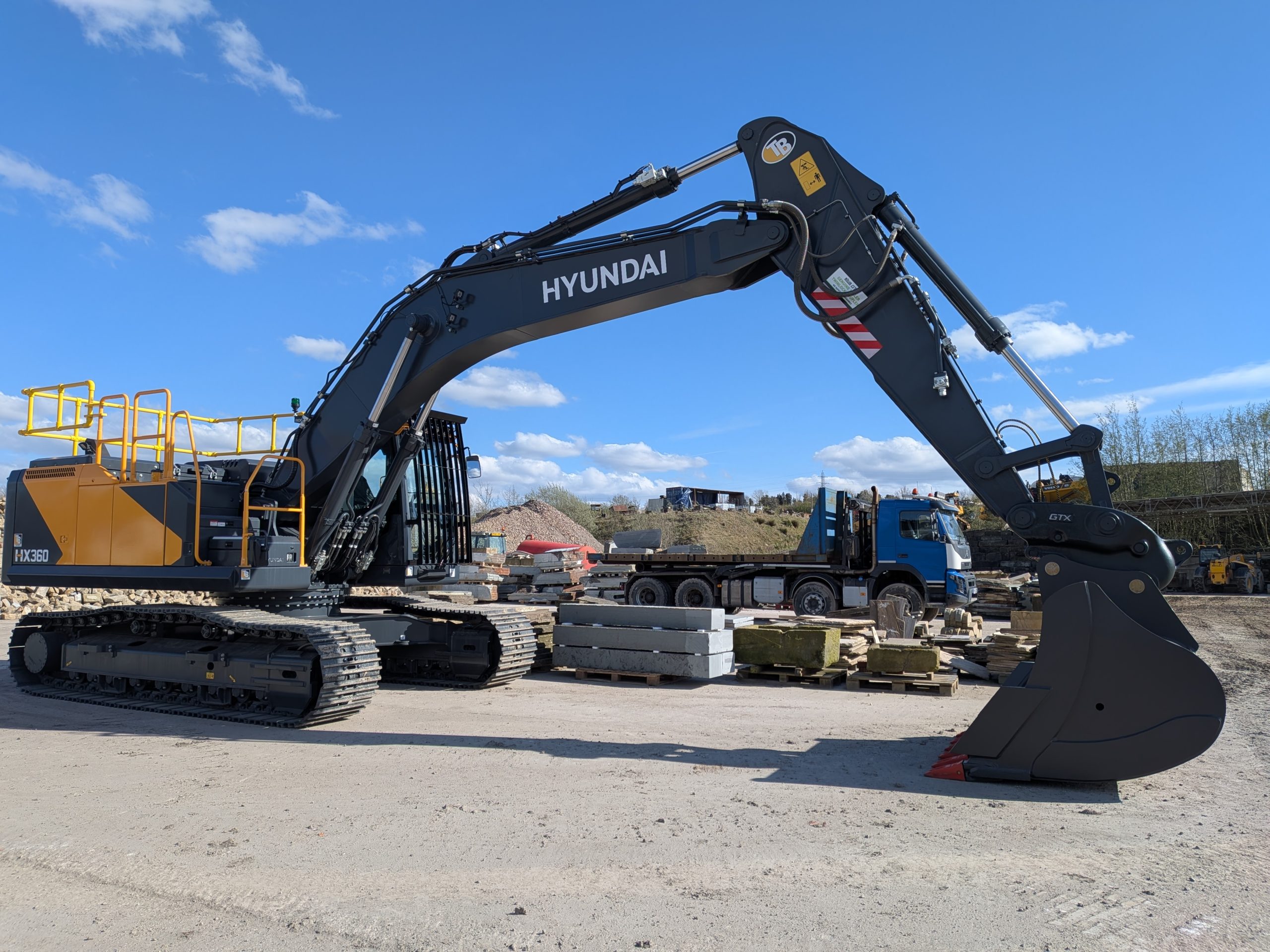 Hyundai HX360L cab view showing dual HD touch screens and electric joystick controls — Hardcore Crushing demolition machinery Lancashire